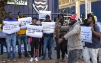 “Bill Gates We Are Not Your Lab Rats!” Africans Protest COVID Vaccine Trials Among Poor